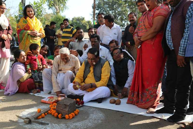 Gupta performs bhoomi-pujan of road asphaltation