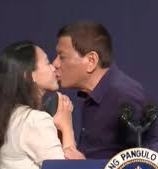 Philippines President kisses a married woman in public