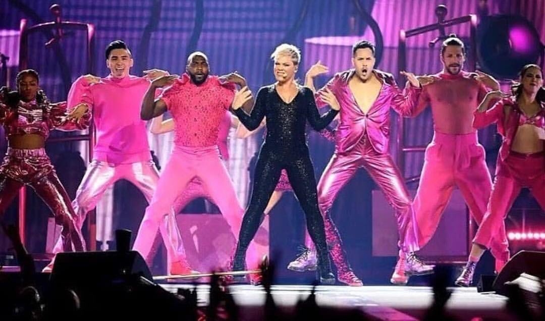 Pink set the stage on fire with songs , kisses daughter on stage