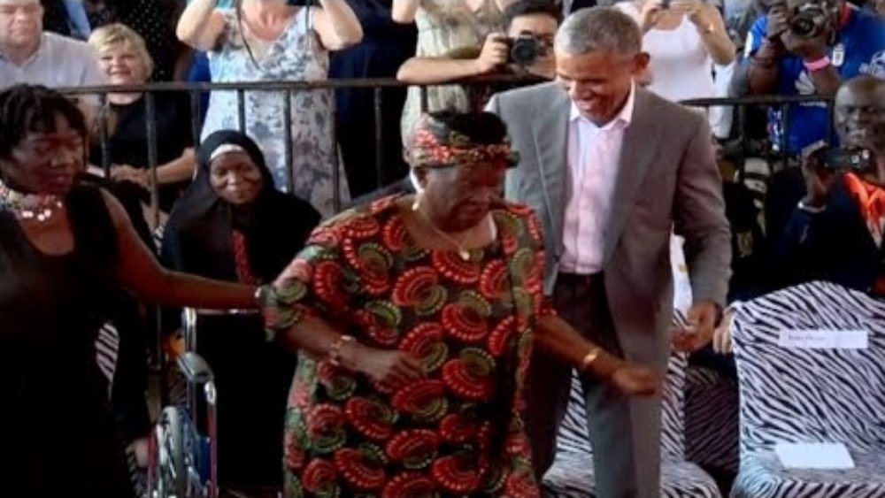 Barack Obama dances with his family in Kenya