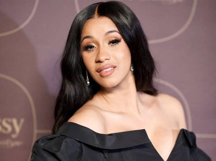 Cardi B gets lap close with husband onstage at BET Awards