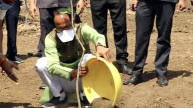 CM Chouhan plants Karanj sapling in Smart Garden