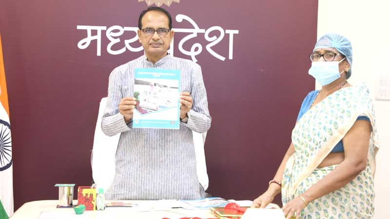 Chief Minister Mr. Chauhan releases book Facility Based Pediatric Care During Covid-19