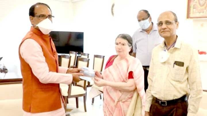 Book "Narmada Parikrama Ek Antaryatra" presented to Chief Minister Chouhan