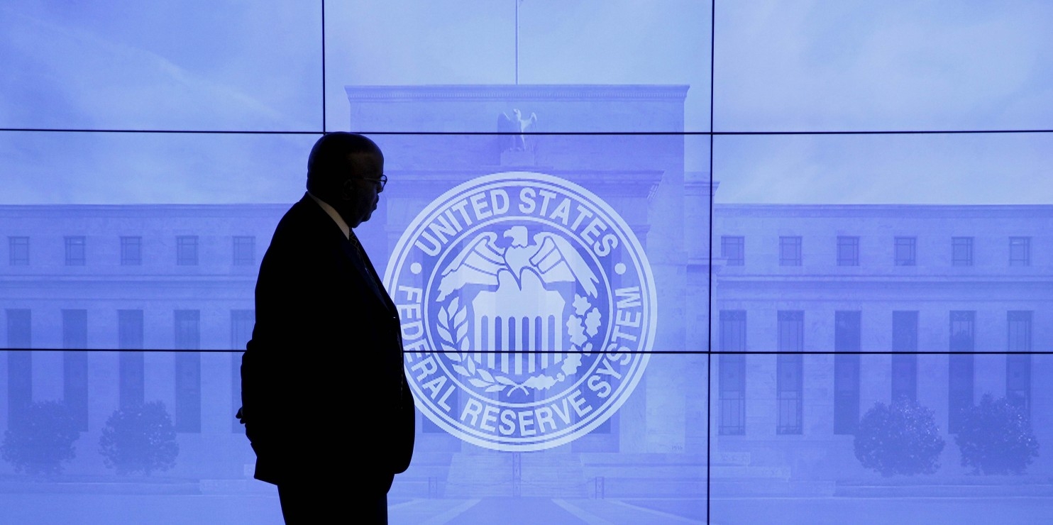  US Fed leaves rates unchanged amid slower economic growth 