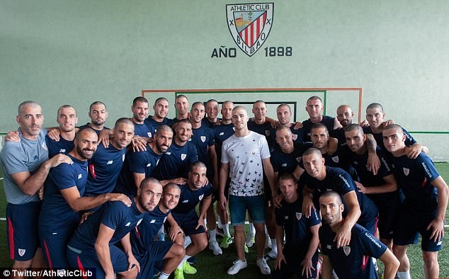 Athletic Bilbao squad shave heads to support defender Alvarez 