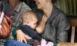  Pink breastfeeds while getting make-up done 