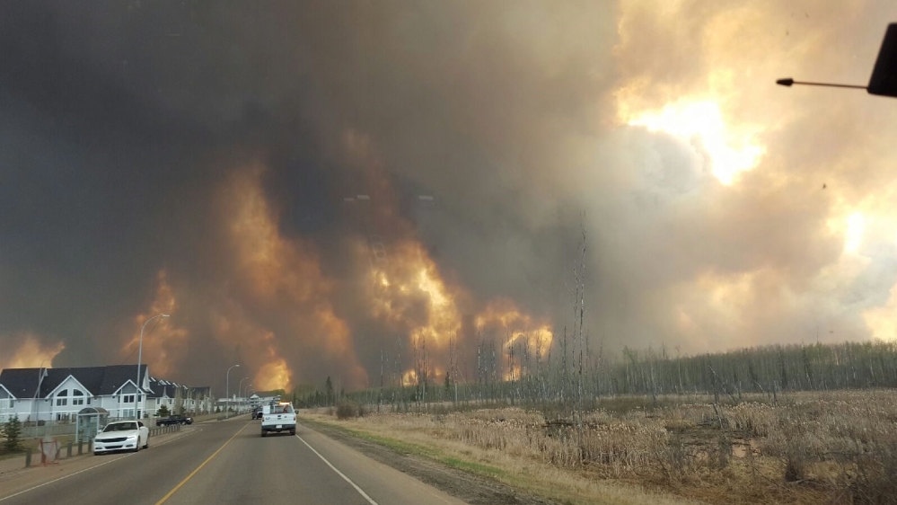  Massive wildfires sweep across Canadian province 