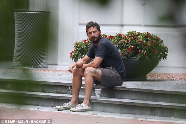  LaBeouf borrows cigarette from fan 