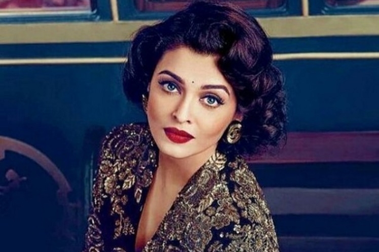 Aishwarya Looks Stunning in new hair do and monochrome Polka!