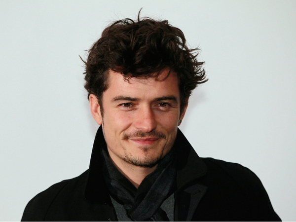  Fame s a burning car, says Orlando Bloom 