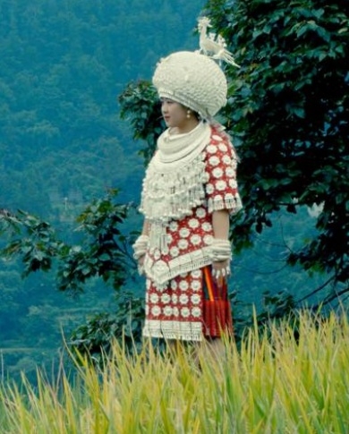Miao, a village where a girl cannot marry if have no silver over her head